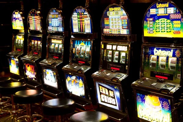 Live blackjack dealer at menara slot studio managing cards in real time